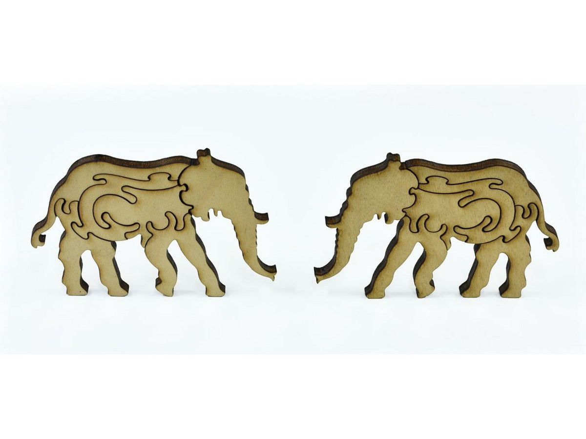 A closeup of pieces in the shape of two elephants.