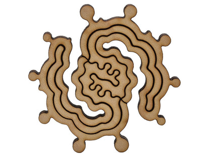 A closeup of pieces shaped like a swirl.