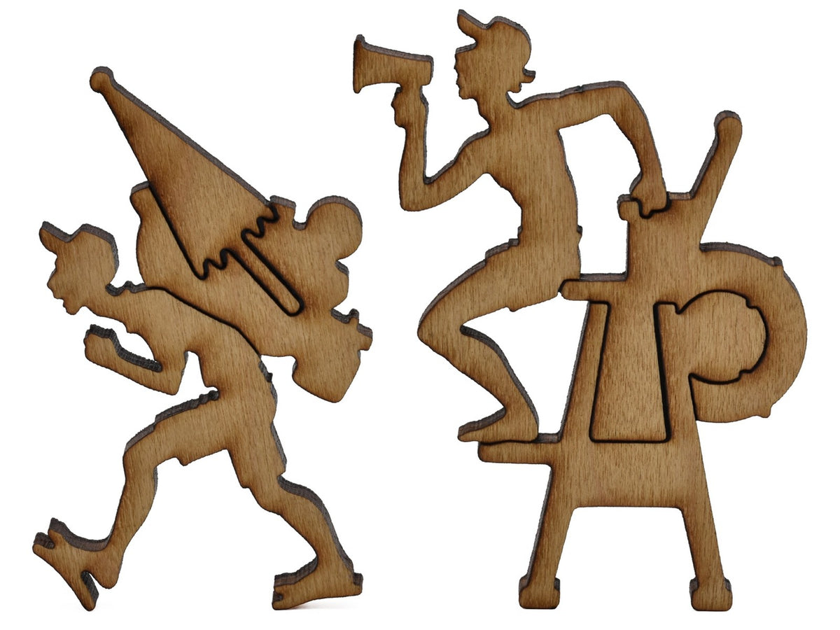 A closeup of pieces shaped like a beachgoer with a backpack and a lifegaurd.