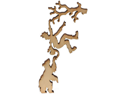 A closeup of pieces showing a bear chasing a man up a tree.