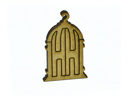 A closeup of pieces in the shape of a birdcage.