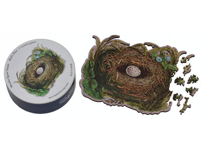 The puzzle, Bird's Nest, with the box that it comes in.