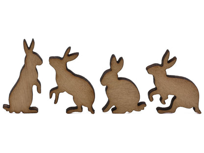 A closeup of pieces shaped like four rabbits.