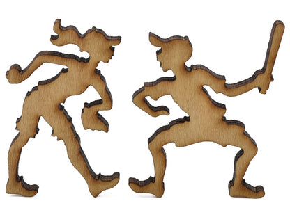 A closeup of pieces shaped like two children playing baseball.