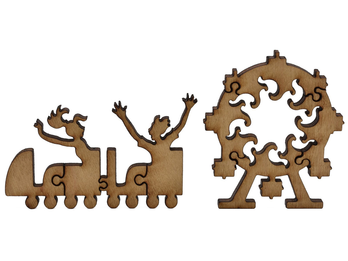 A closeup of pieces shaped like a children's train and a Ferris wheel.