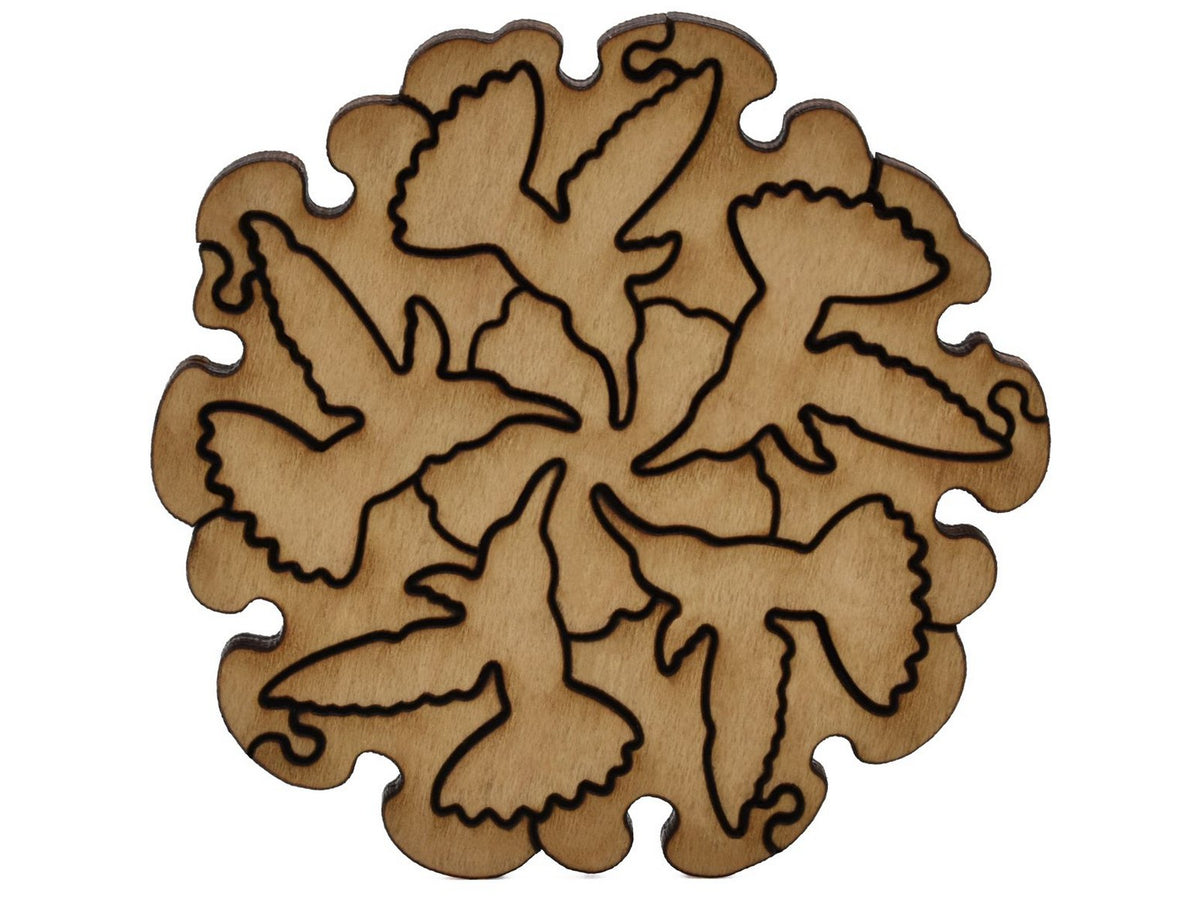 A closeup of pieces shaped like five hummingbirds in a circle pattern.