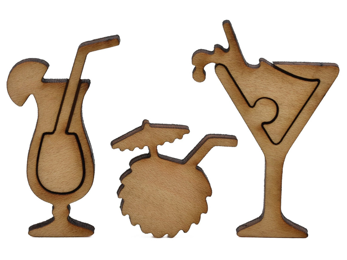 A closeup of pieces shaped like three cocktails.