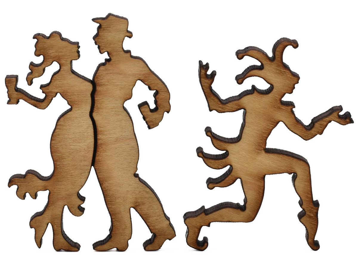 A closeup of pieces shaped like a couple and a jester.
