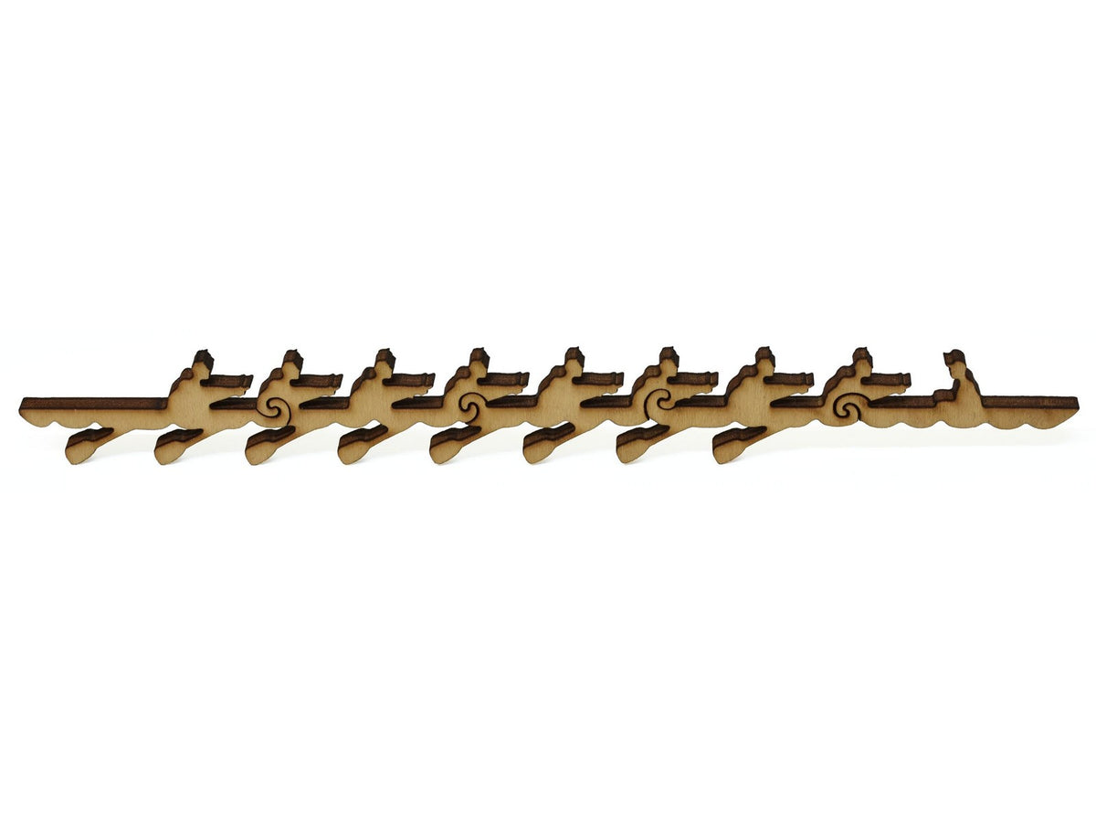 A closeup of pieces showing a crew of rowers in their boat.