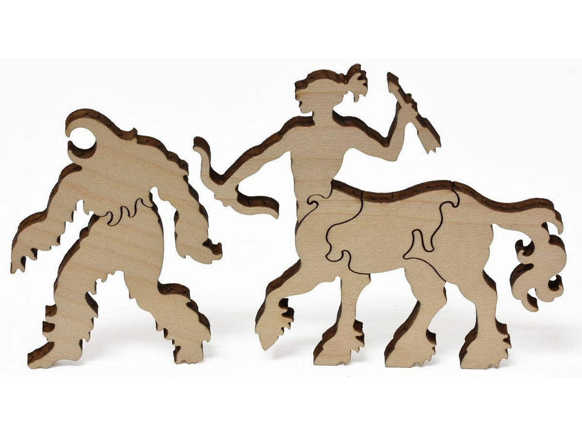 A closeup of pieces that show a cyclops and a centaur from Canoe of Fate.