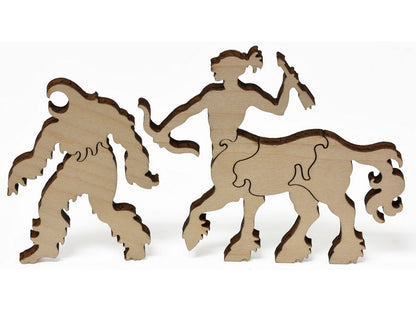 A closeup of pieces that show a cyclops and a centaur from Canoe of Fate.