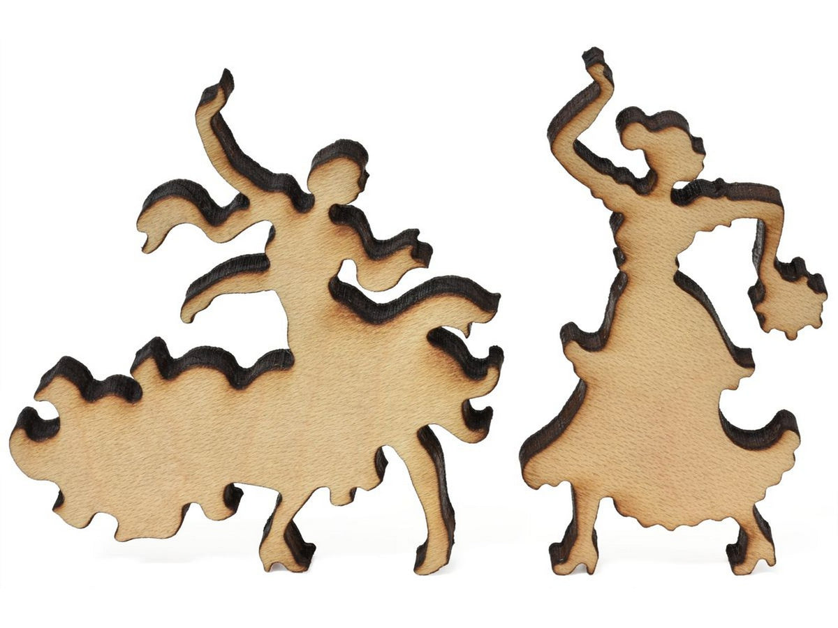A closeup of pieces showing two dancers.