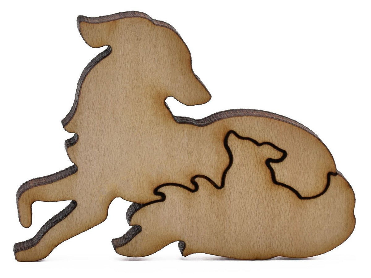 A closeup of pieces shaped like a dog with its puppy.