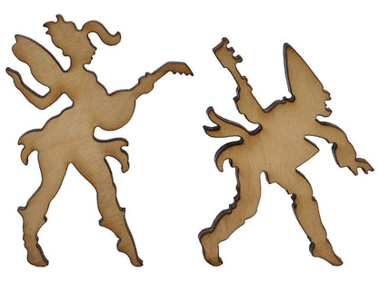 A closeup of pieces shaped like two fairies playing instruments.