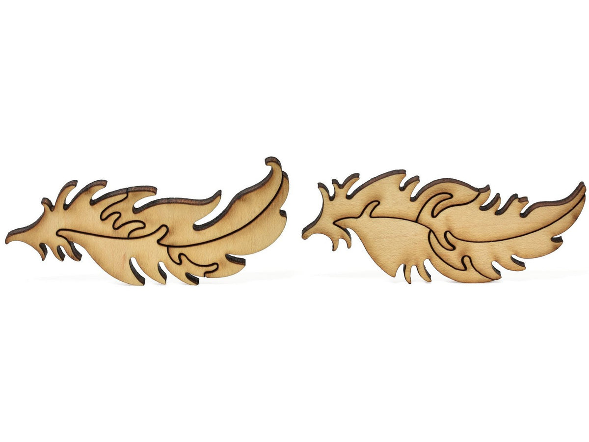 A closeup of pieces showing two multi-piece feathers.