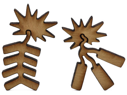 A closeup of pieces shaped like two firecrackers.