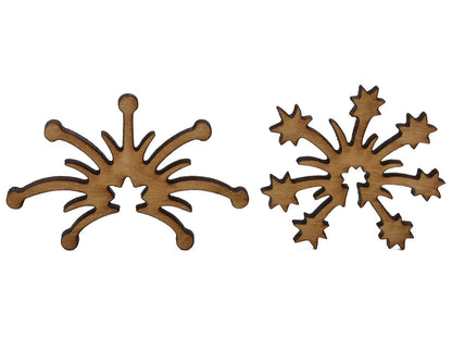 A closeup of pieces shaped like two fireworks exploding.