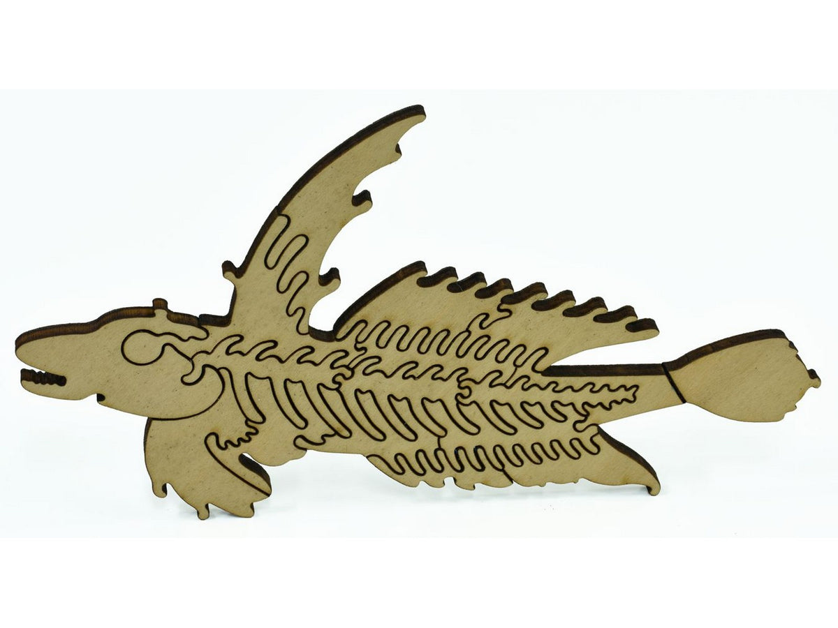 A closeup of pieces showing a large multi-piece fish from the back.