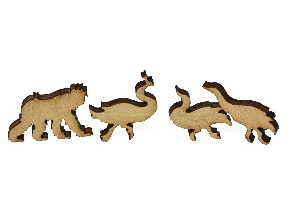 A closeup of pieces showing a monkey and three ducks.