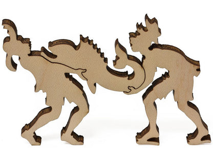A closeup of pieces that show two men carrying a large fish from Fisherman or Exotic Lands.