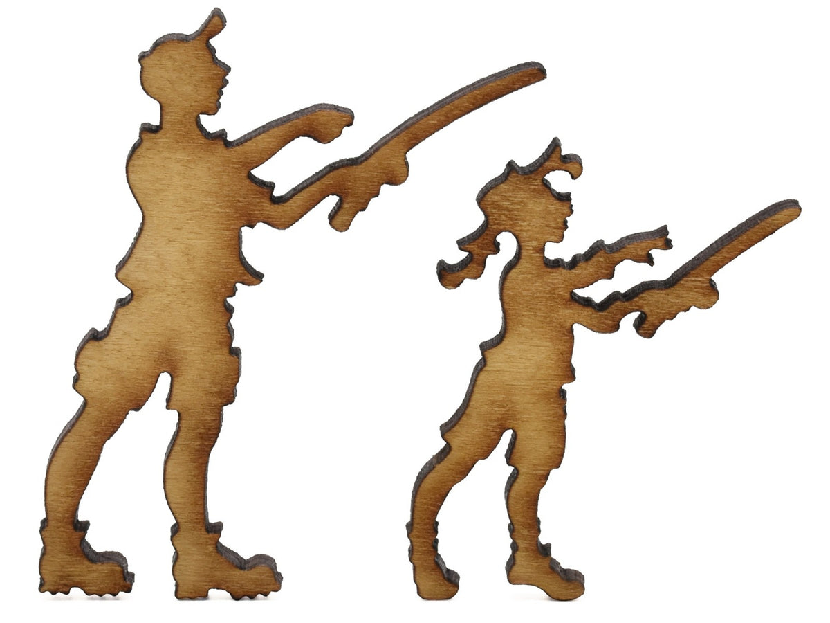 A closeup of pieces shaped like an adult and child fishing.