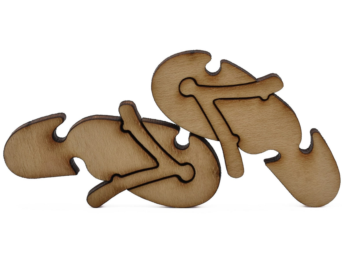 A closeup of pieces shaped like a pair of flip flops.
