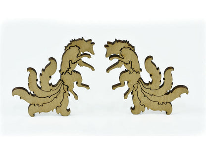 A closeup of pieces in the shape of foxes.