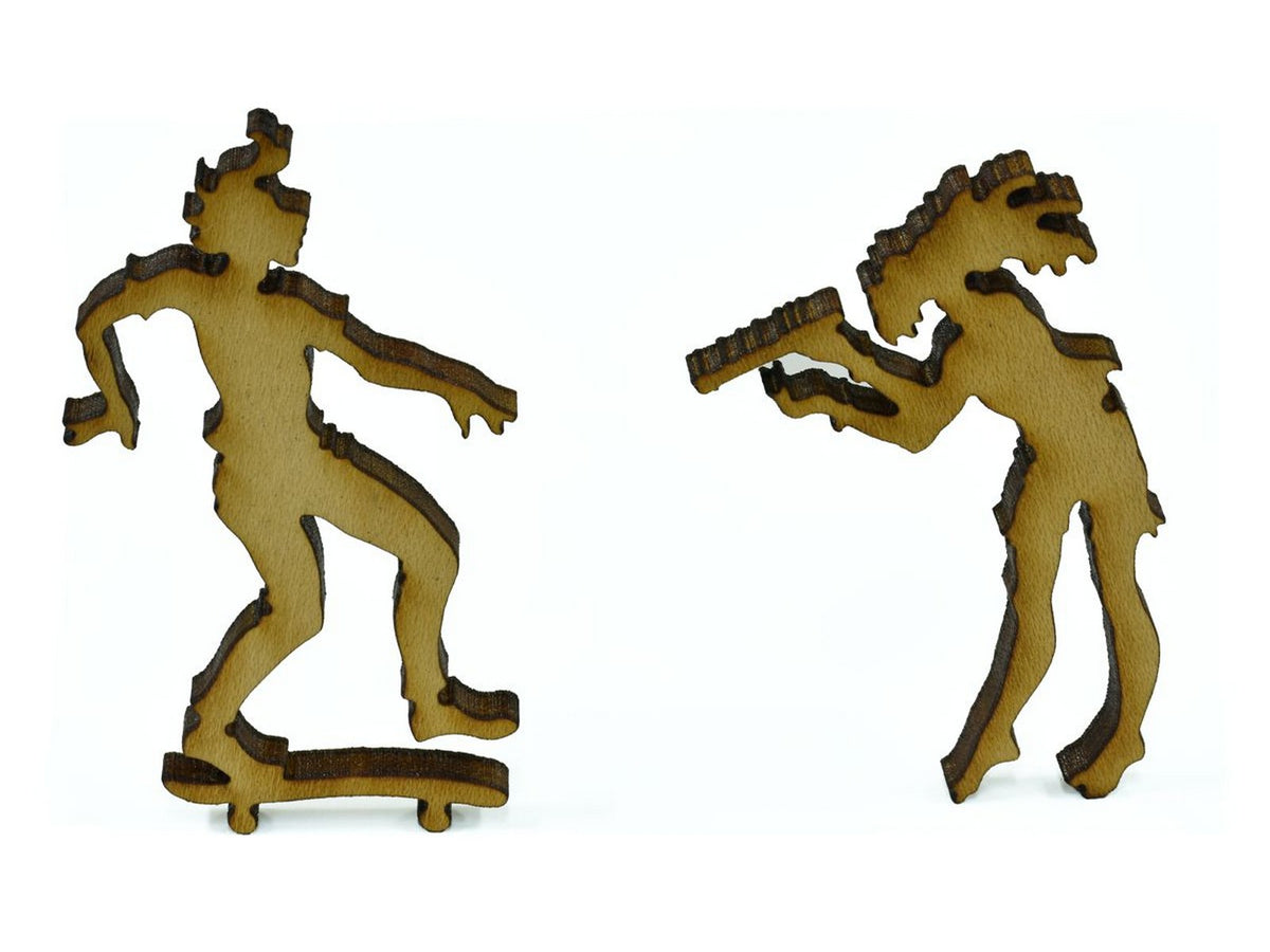 A closeup of pieces in the shape of two people.