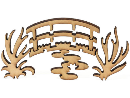 A closeup of pieces showing Monet's bridge and water lilies.