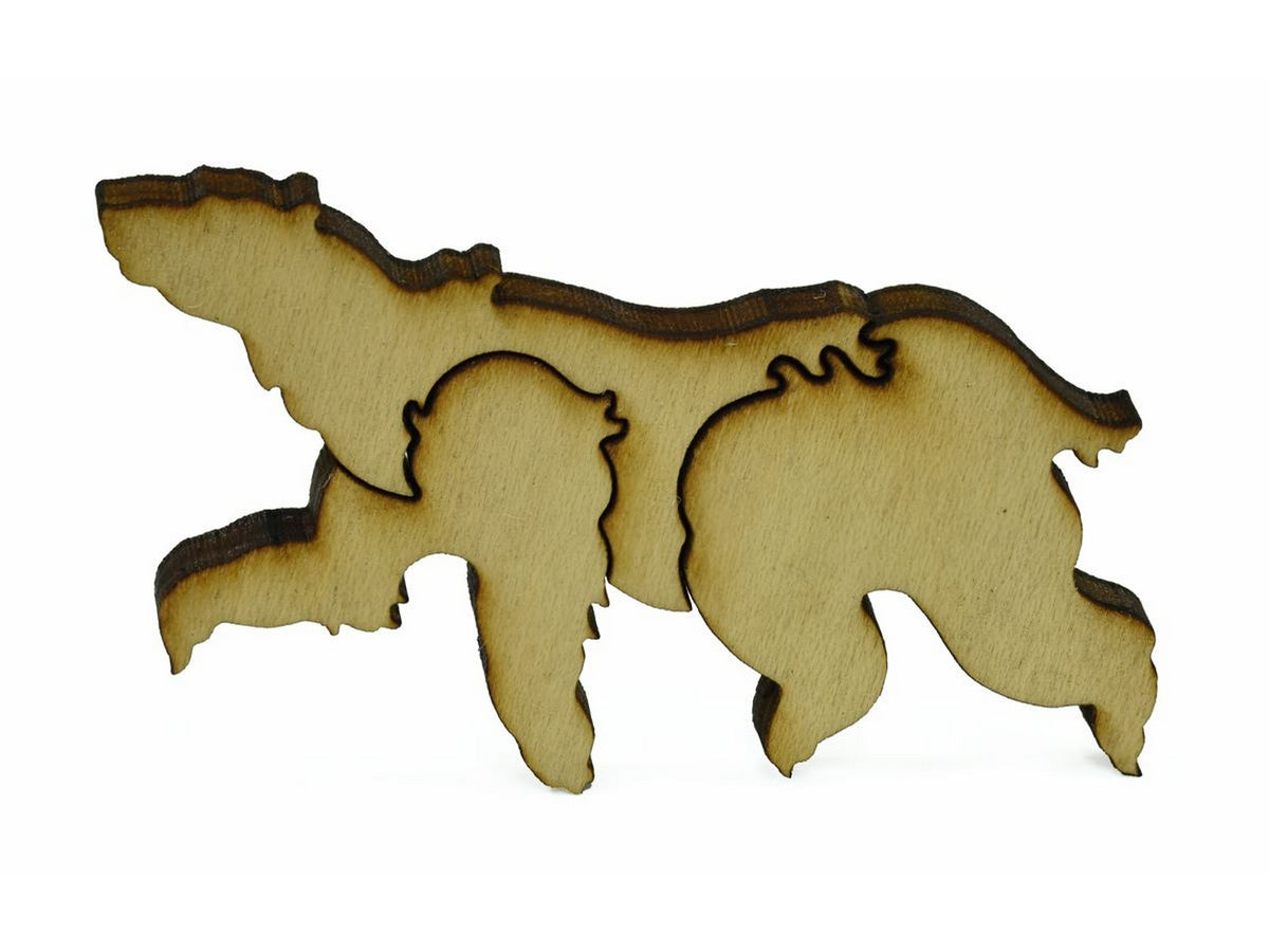 A closeup of pieces in the shape of a polar bear.