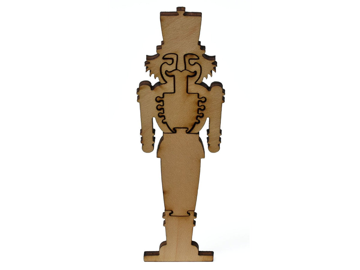 A closeup of pieces showing a multi-piece nutcracker.