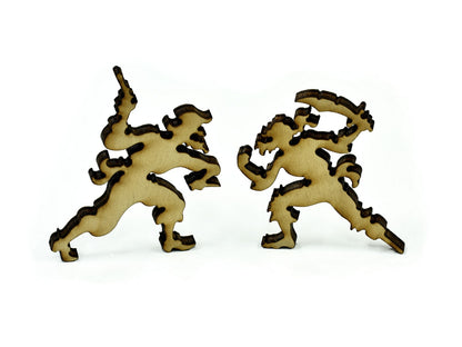A closeup of pieces in the shape of two pirates.