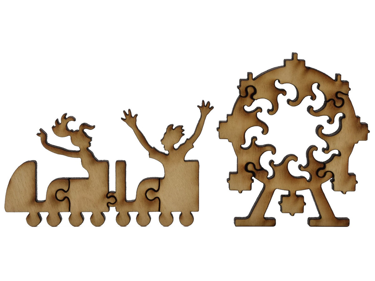 A closeup of pieces shaped like a rollercoaster and a Ferris wheel.