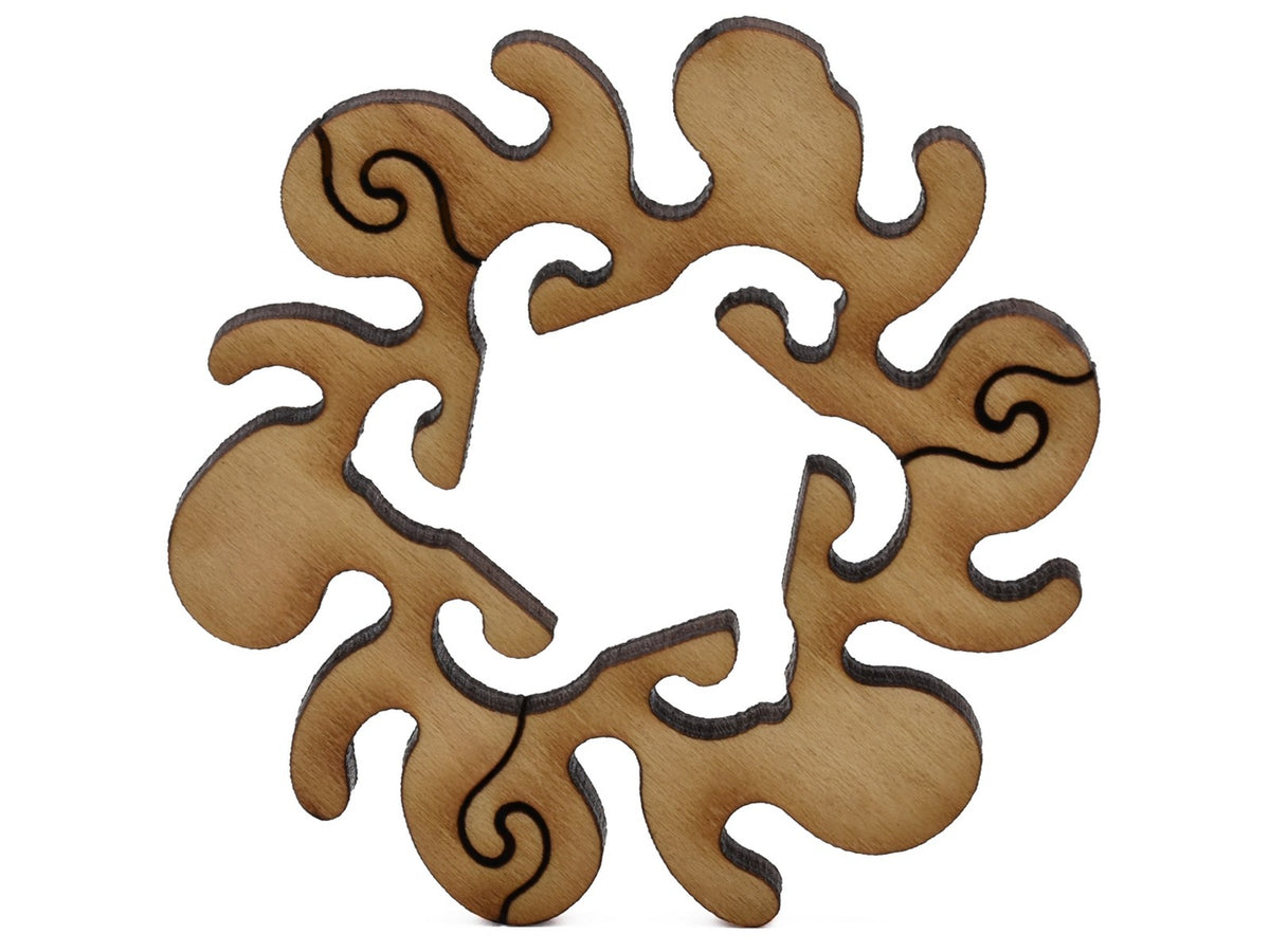 A closeup of pieces shaped like a round symmetrical flower.