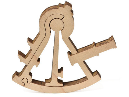 A closeup of pieces that show a sextant from Monet's Sailboat at Le Petit Gennevilliers.