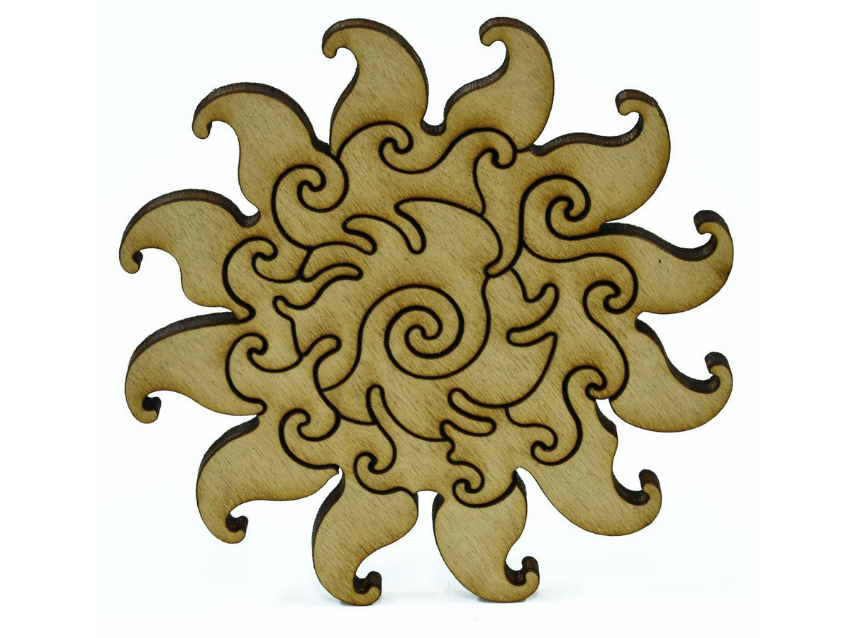 A closeup of pieces shaped like a large sun.