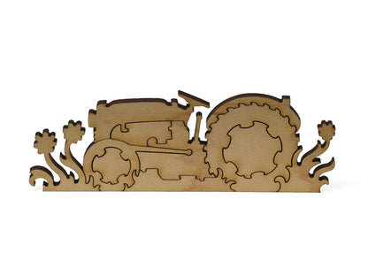A closeup of pieces showing a multi-piece tractor.