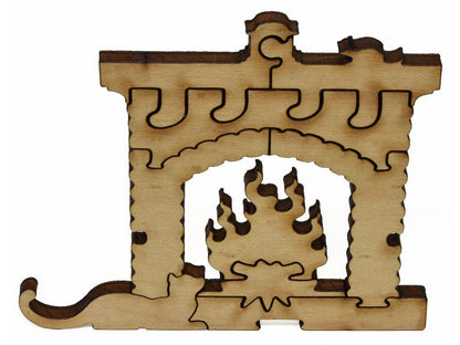 A closeup of pieces showing a cat laying next to a fireplace.