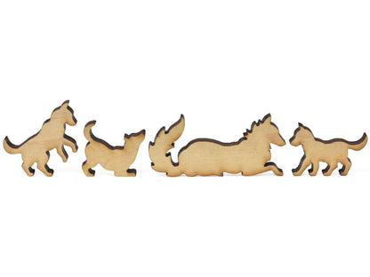 A closeup of pieces showing a wolf with her pups.