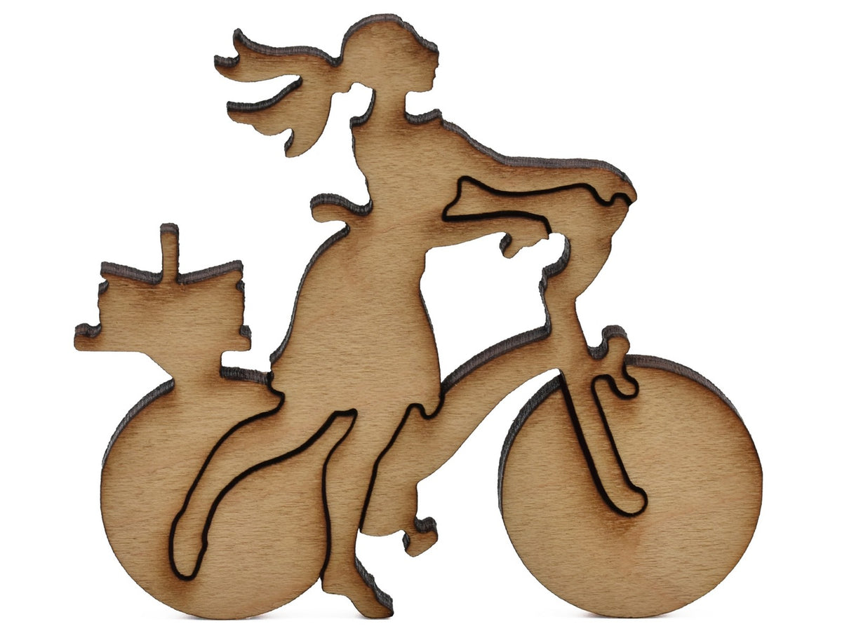 A closeup of pieces shaped like a woman riding a bike.