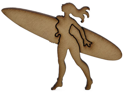 A closeup of pieces shaped like a woman holding a surfboard.