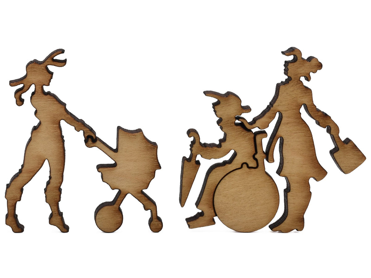 A closeup of pieces shaped like a woman pushing a stroller and a woman pushing a wheelchair.