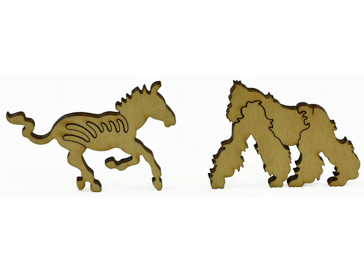 A closeup of pieces showing a zebra and a gorilla.