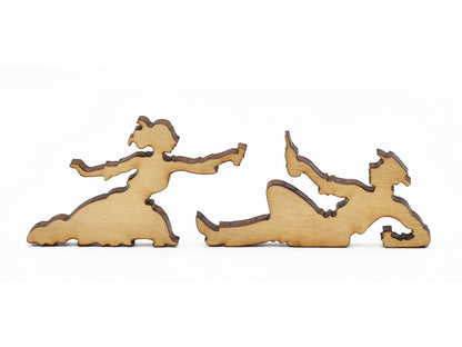 A closeup of pieces in the shape of two picnickers sharing a drink. 
