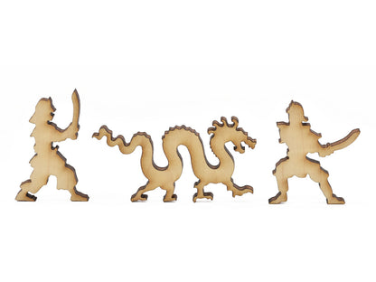 A closeup of pieces in the shape of a dragon and samurai warriors.
