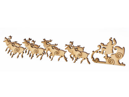 A closeup of pieces in the shape of Santa and his sleigh.