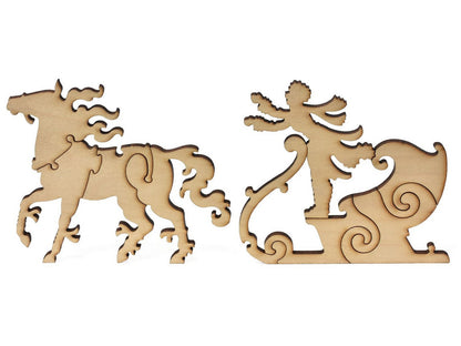 A closeup of pieces shaped like a horse and sleigh.
