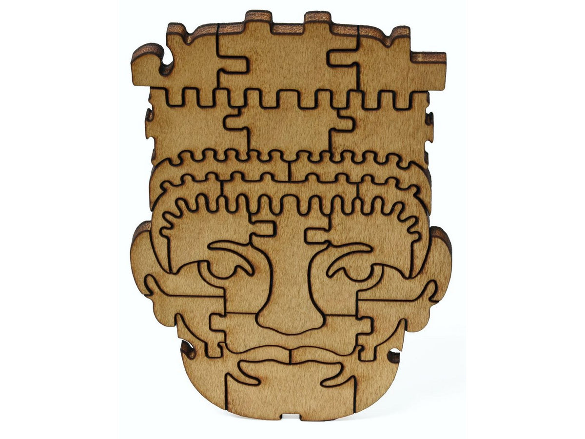 A closeup of pieces showing a head with a ceremonial headdress.