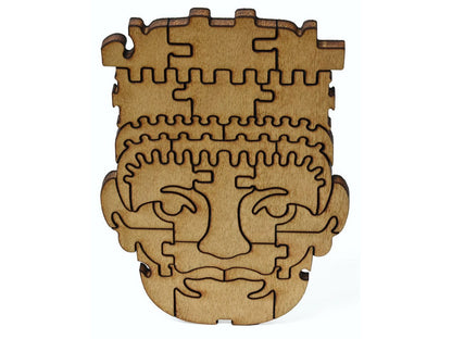 A closeup of pieces showing a head with a ceremonial headdress.
