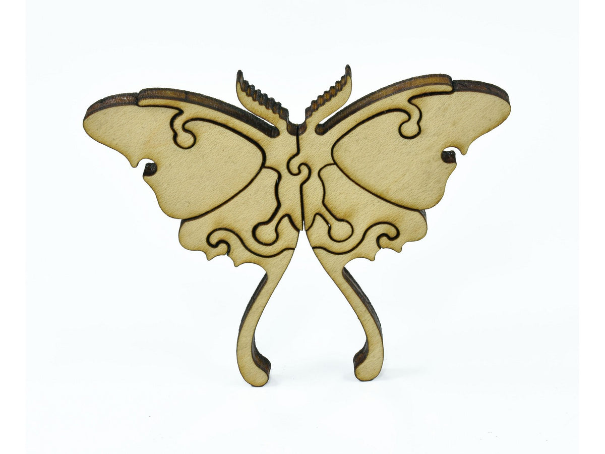 A closeup of pieces in the shape of luna moth.